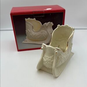 Centurion Collection musical cream and gold holiday sleigh,